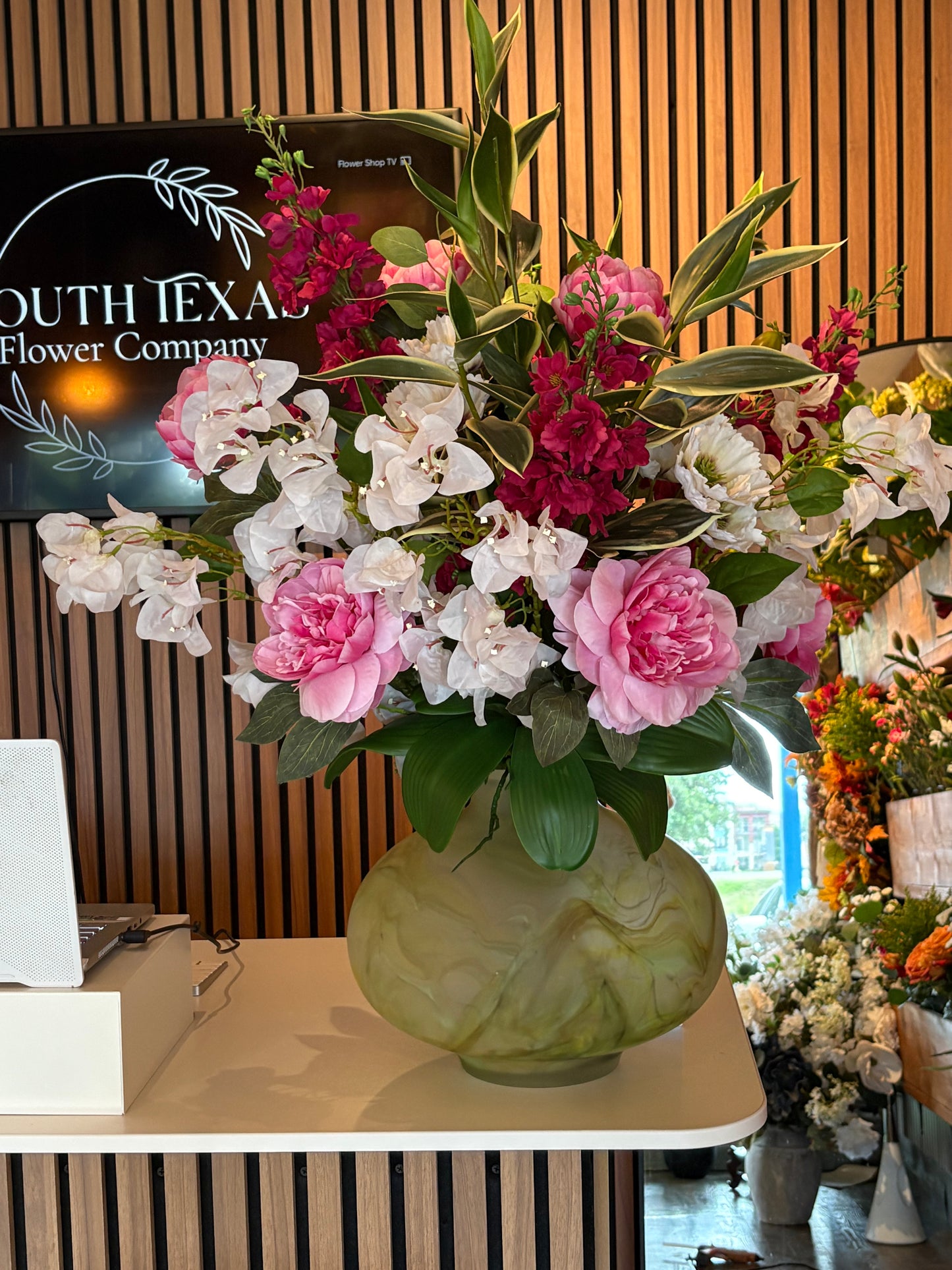 Peonies, delphinium Bugambilia arrangement